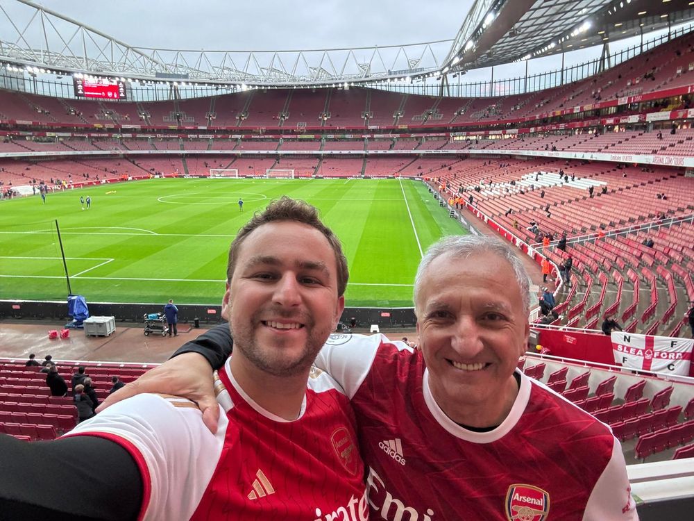 A selfie with my dad in the stands at the Emirates, both in Arsenal shirts